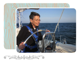 Image of author Angele Passe sailing her boat